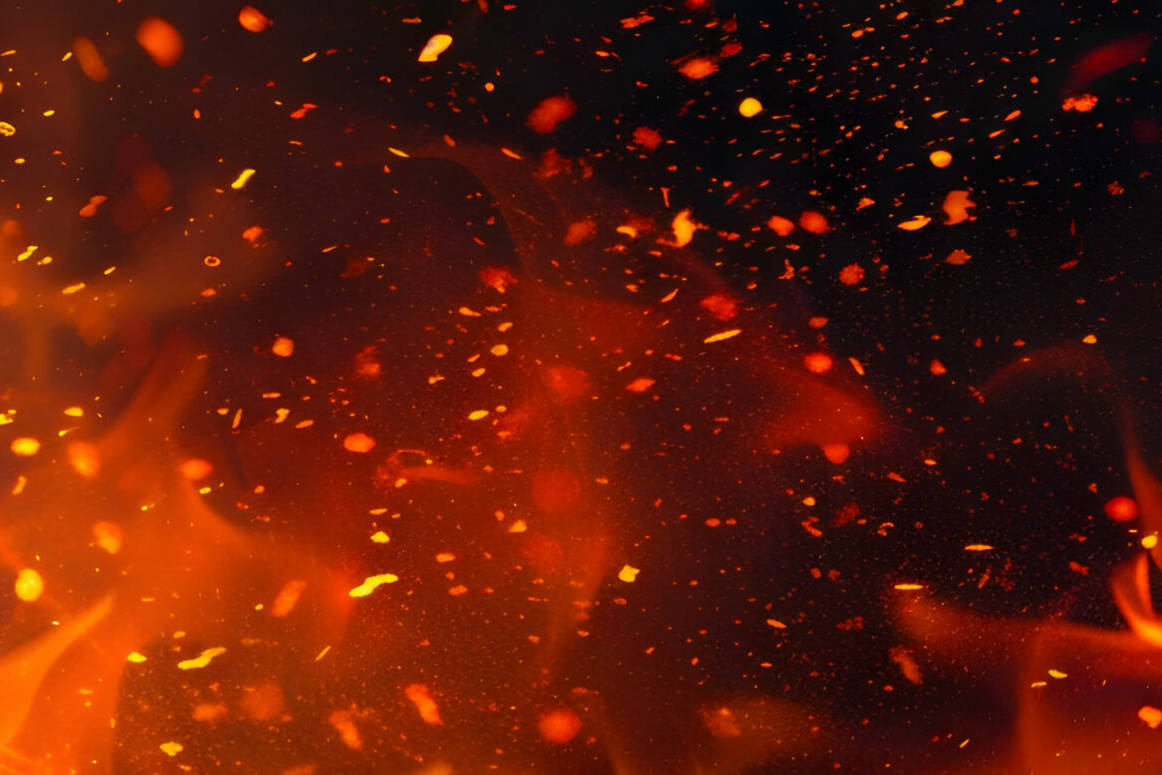 fire flame with sparkle black background2 scaled uai